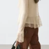 Gilets en mélange de lin avec détails à volants Gilets en mélange de lin avec détails à volants