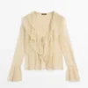 Gilets en mélange de lin avec détails à volants Gilets en mélange de lin avec détails à volants
