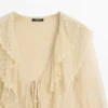 Gilets en mélange de lin avec détails à volants Gilets en mélange de lin avec détails à volants