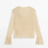 Gilets en mélange de lin avec détails à volants Gilets en mélange de lin avec détails à volants