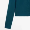 Gilets en tricot de laine avec boutons recouverts Gilets en tricot de laine avec boutons recouverts