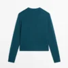 Gilets en tricot de laine avec boutons recouverts Gilets en tricot de laine avec boutons recouverts