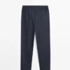 Haut de pyjama à manches courtes et pantalons rayés Haut de pyjama à manches courtes et pantalons rayés