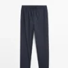 Haut de pyjama à manches courtes et pantalons rayés Haut de pyjama à manches courtes et pantalons rayés