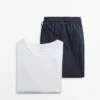 Haut de pyjama à manches courtes et pantalons rayés Haut de pyjama à manches courtes et pantalons rayés