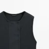 Haut en coton mélangé avec patte de boutonnage Haut en coton mélangé avec patte de boutonnage