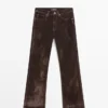 Jean bootcut à taille haute et finition floquée
