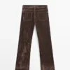 Jean bootcut à taille haute et finition floquée