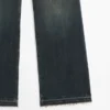 Jean à taille moyenne et pattes d’éléphant Jean à taille moyenne et pattes d’éléphant