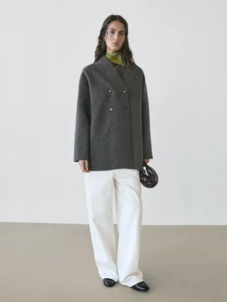 Long gilet en laine à double boutonnage