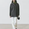 Long gilet en laine à double boutonnage