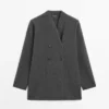 Long gilet en laine à double boutonnage