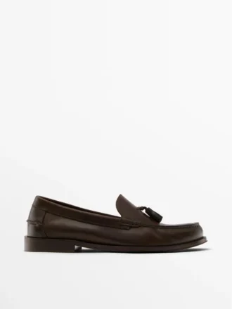 Mocassins en cuir huilé souple avec pompons