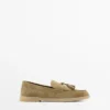 Mocassins en cuir refendu avec pompons Mocassins en cuir refendu avec pompons