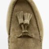 Mocassins en cuir refendu avec pompons Mocassins en cuir refendu avec pompons