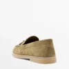 Mocassins en cuir refendu avec pompons Mocassins en cuir refendu avec pompons