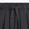 Pantalon ample à jambes larges et plissé Pantalon ample à jambes larges et plissé