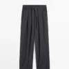 Pantalon ample à jambes larges et plissé Pantalon ample à jambes larges et plissé