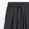 Pantalon ample à jambes larges et plissé Pantalon ample à jambes larges et plissé