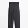 Pantalon ample à jambes larges et plissé Pantalon ample à jambes larges et plissé