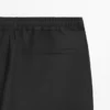 Pantalon en laine à la coupe décontractée Pantalon en laine à la coupe décontractée