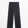 Pantalon en lin à jambes larges et à fines rayures Pantalon en lin à jambes larges et à fines rayures