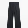 Pantalon en lin à jambes larges et à fines rayures Pantalon en lin à jambes larges et à fines rayures