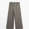 Pantalon à jambes larges avec détails rayés
