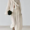 Pantalon sarouel fluide avec détails plissés Pantalon sarouel fluide avec détails plissés