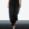 Pantalon sarouel semi-transparent avec boutons Pantalon sarouel semi-transparent avec boutons