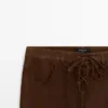 Pantalons courts en cuir suédé avec cordons de serrage Pantalons courts en cuir suédé avec cordons de serrage