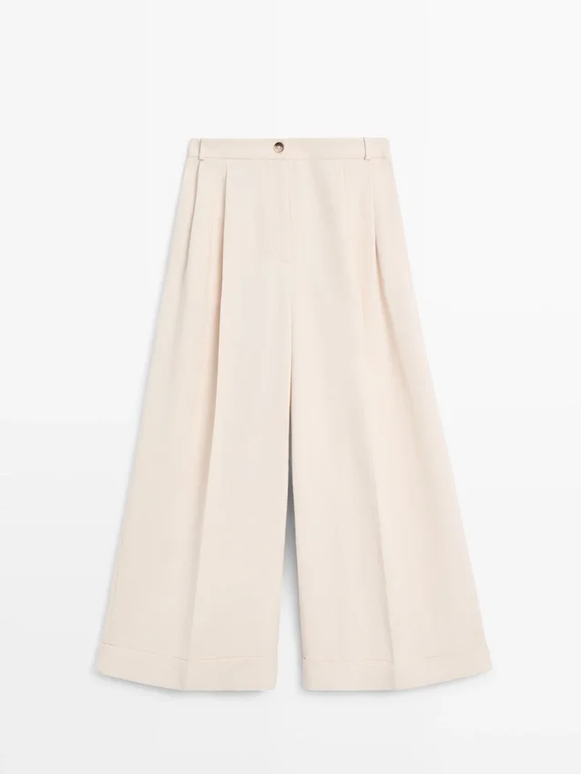 Pantalons fluides avec ourlets retroussés Pantalons fluides avec ourlets retroussés