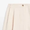 Pantalons fluides avec ourlets retroussés Pantalons fluides avec ourlets retroussés