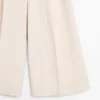 Pantalons fluides avec ourlets retroussés Pantalons fluides avec ourlets retroussés
