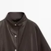 Parka-cape en cuir nappa avec poches Parka-cape en cuir nappa avec poches