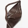 Petit sac à bandoulière en cuir tressé Petit sac à bandoulière en cuir tressé