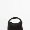 Petit sac en cuir refendu tressé Petit sac en cuir refendu tressé