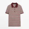 Polos en coton avec détails rayés Polos en coton avec détails rayés