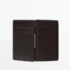 Portefeuille vertical en cuir nappa « Magic » Portefeuille vertical en cuir nappa « Magic »