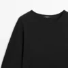 Pull avec détails en dentelle contrastée Pull avec détails en dentelle contrastée