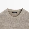 Pull à col rond en maille rayée