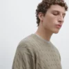 Pull en coton à mailles torsadées
