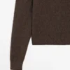 Pull en maille à col montant avec boutons-pression Pull en maille à col montant avec boutons-pression