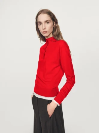 Pull en maille à col roulé boutonné
