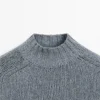 Pull en maille de coton mélangé avec col roulé Pull en maille de coton mélangé avec col roulé