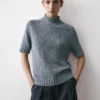 Pull en maille de coton mélangé avec col roulé Pull en maille de coton mélangé avec col roulé