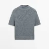 Pull en maille de coton mélangé avec col roulé Pull en maille de coton mélangé avec col roulé