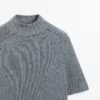 Pull en maille de coton mélangé avec col roulé Pull en maille de coton mélangé avec col roulé
