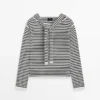 Pull en maille rayée avec détail sur les manches Pull en maille rayée avec détail sur les manches