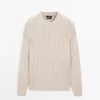 Pull en maille torsadée 100 % coton à col rond Pull en maille torsadée 100 % coton à col rond